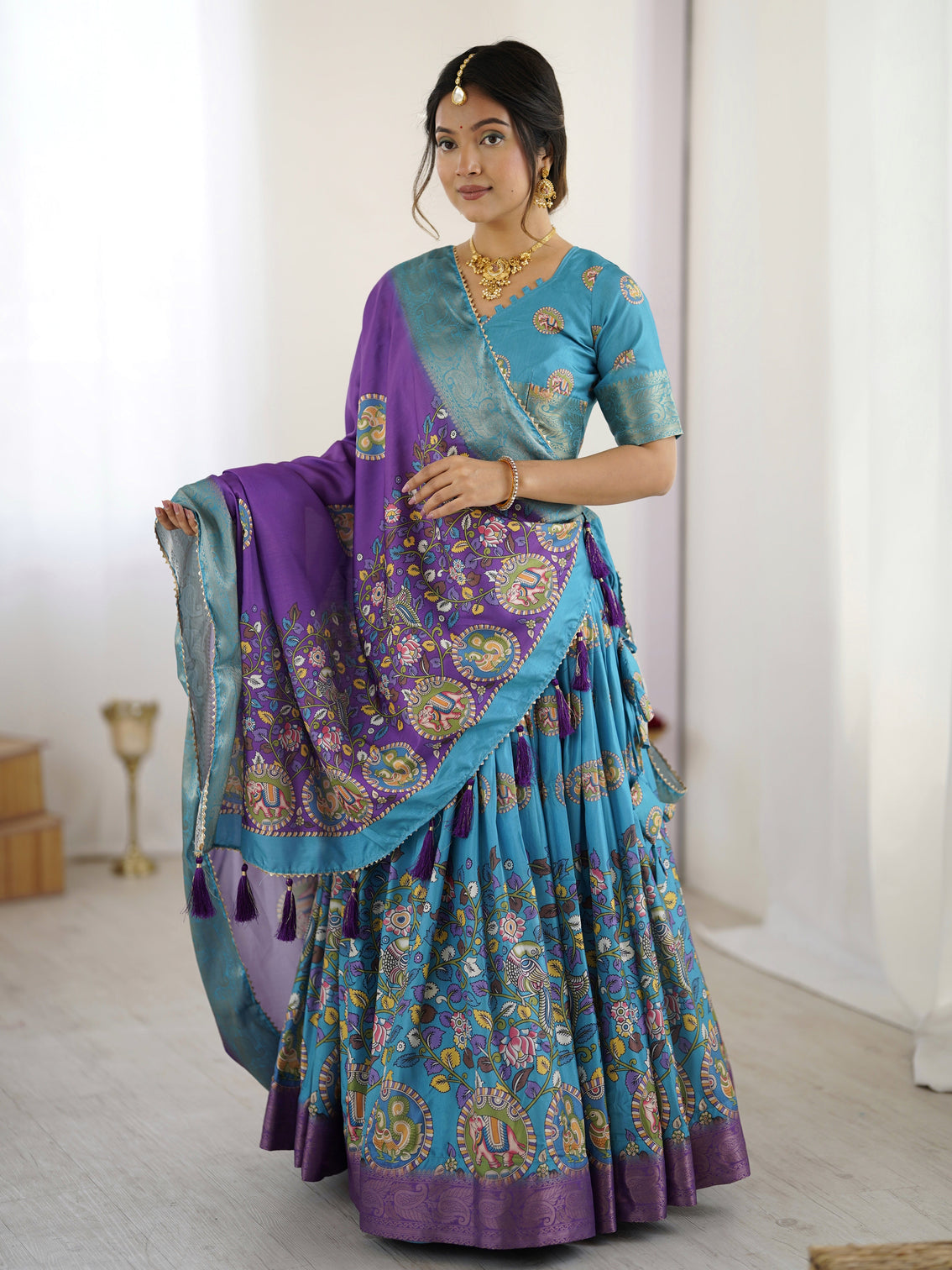 Turquoise blue purple kalamkari tussar silk lehenga with zari border tassel dupatta wedding festive wear
