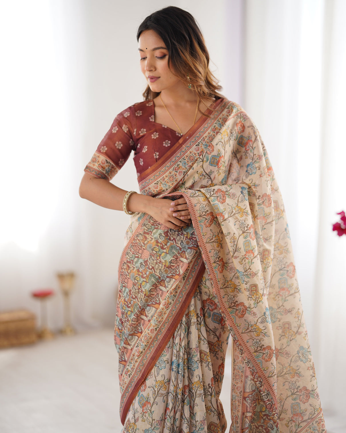 Beige maroon handloom cotton saree with multicolor floral print and majestic bird art pallu
