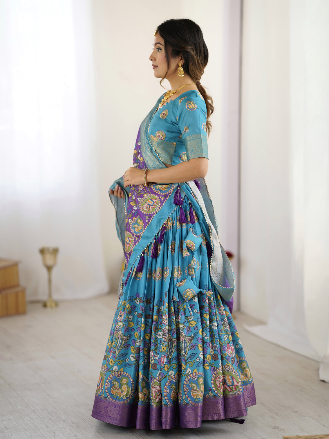 Turquoise blue purple kalamkari tussar silk lehenga with zari border tassel dupatta wedding festive wear