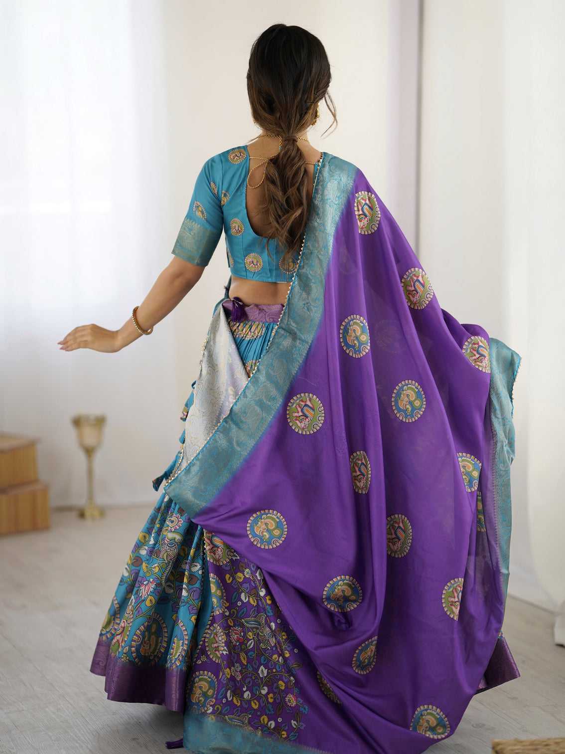 Turquoise blue purple kalamkari tussar silk lehenga with zari border tassel dupatta wedding festive wear