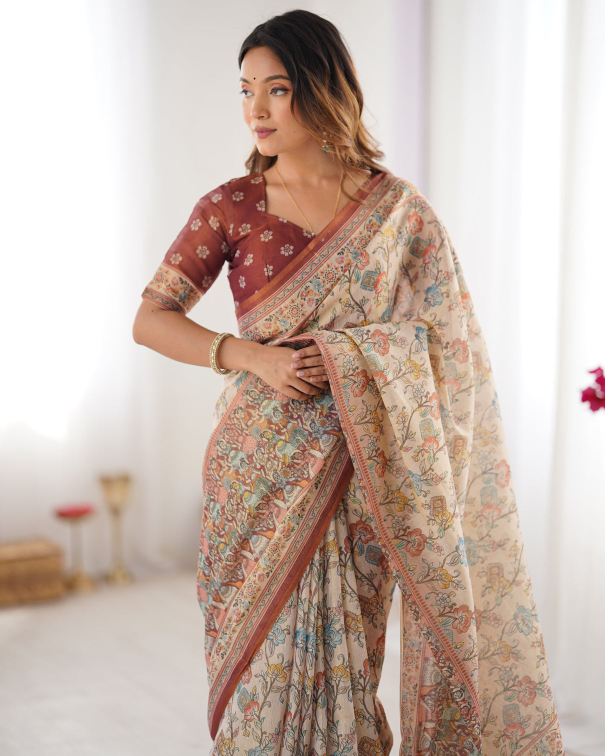 Beige maroon handloom cotton saree with multicolor floral print and majestic bird art pallu