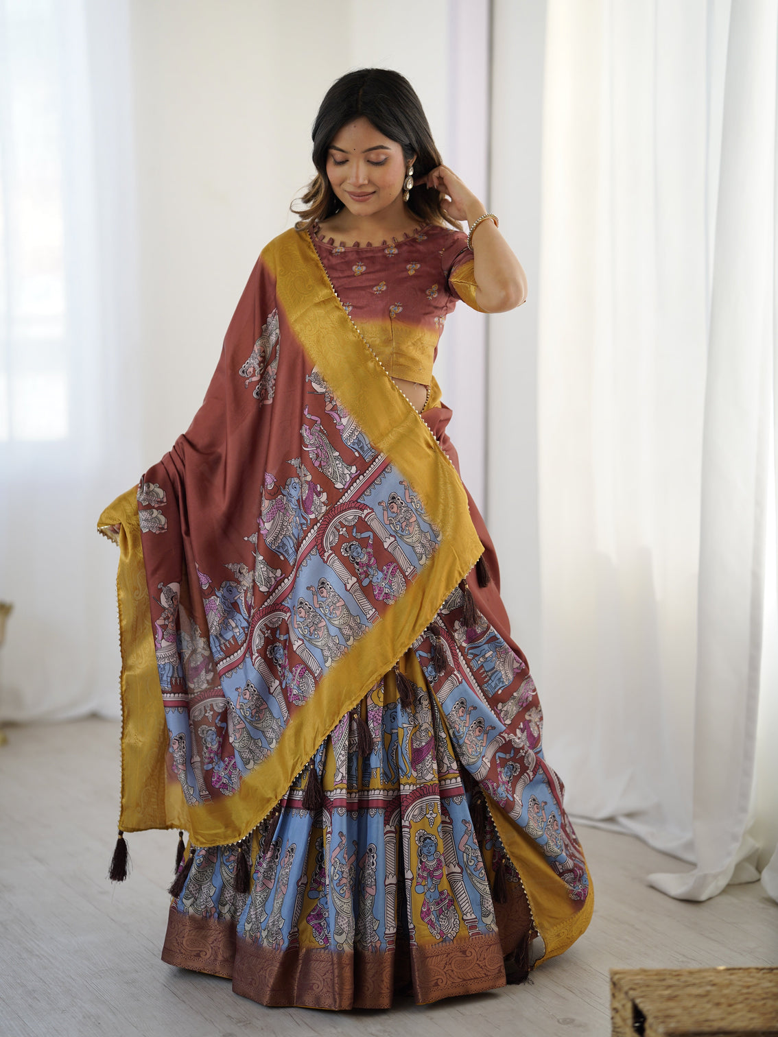 Elegant kalamkari lehenga in maroon and mustard with flared skirt and dupatta mameraa
