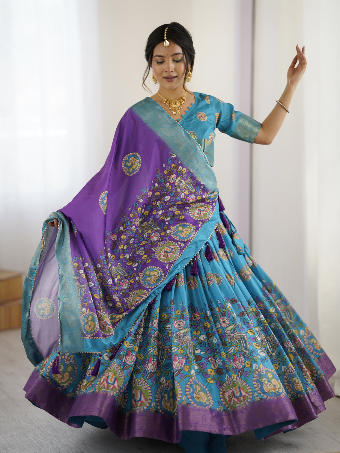 Turquoise blue purple kalamkari tussar silk lehenga with zari border tassel dupatta wedding festive wear