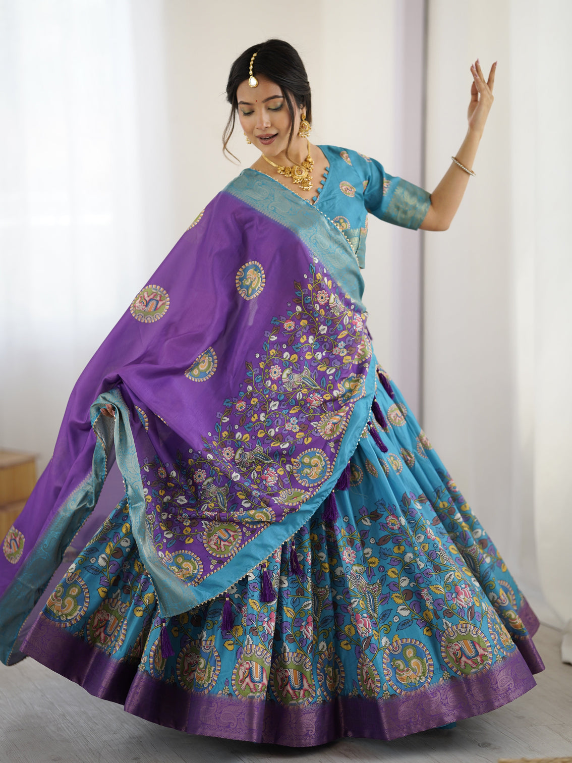 Turquoise blue purple kalamkari tussar silk lehenga with zari border tassel dupatta wedding festive wear mameraa
