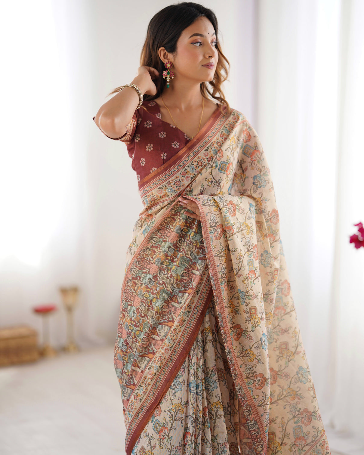 Beige maroon handloom cotton saree with multicolor floral print and majestic bird art pallu
