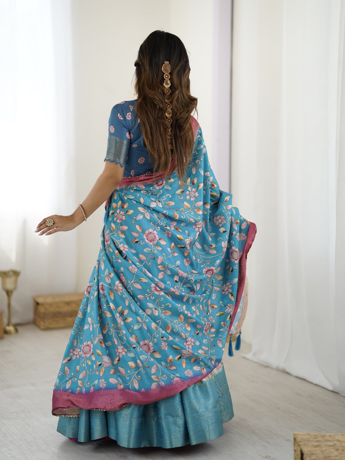 Peacock blue kalamkari lehenga with divine print and floral embroidered dupatta