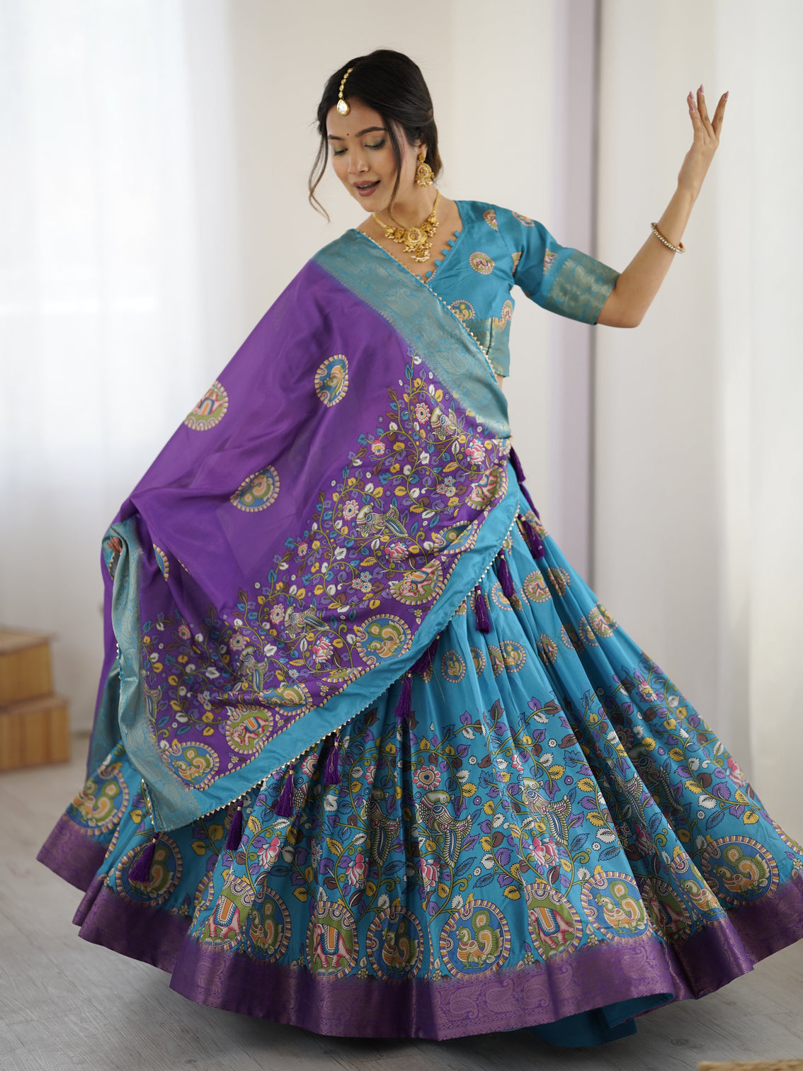 Turquoise blue purple kalamkari tussar silk lehenga with zari border tassel dupatta wedding festive wear