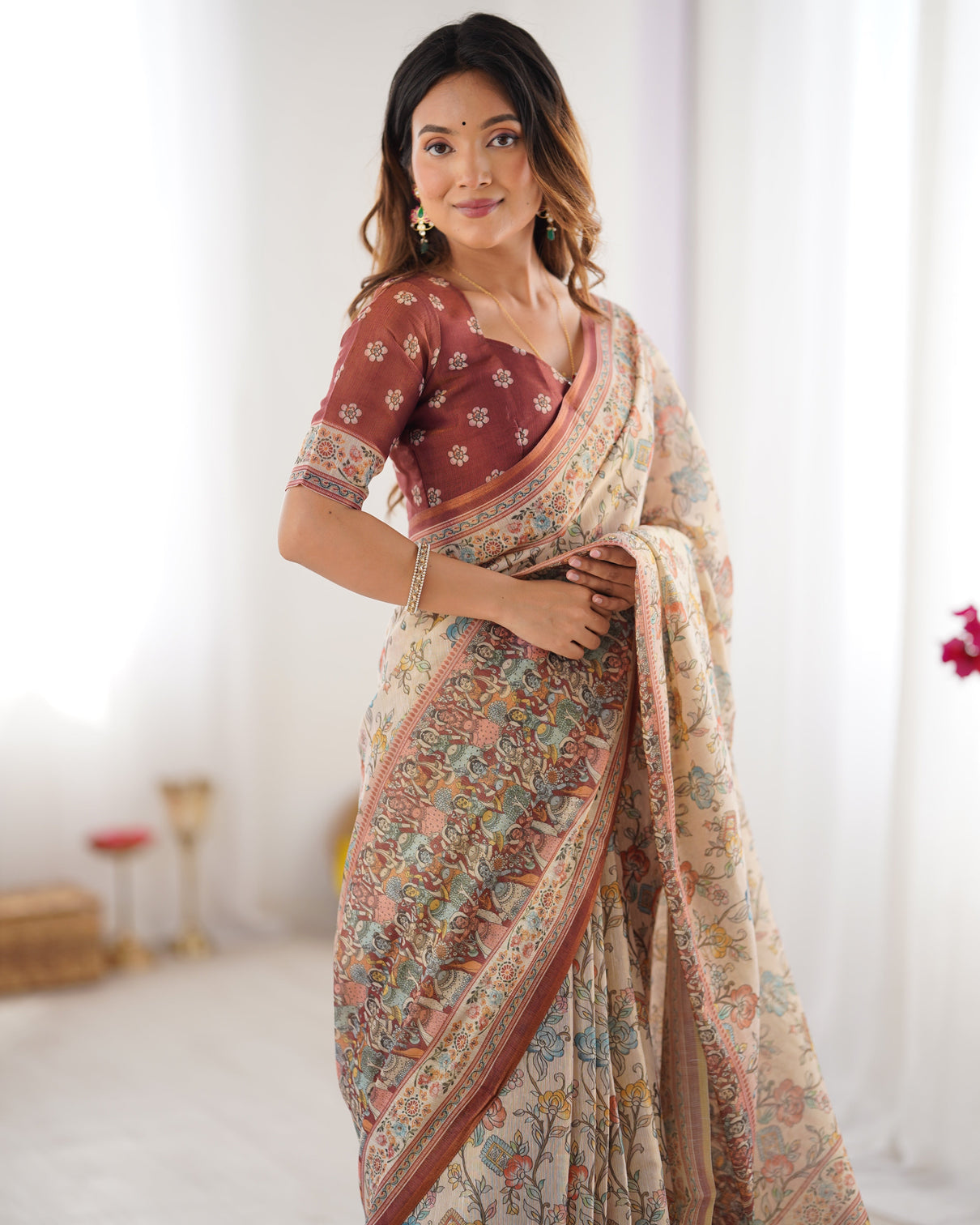 Beige maroon handloom cotton saree with multicolor floral print and majestic bird art pallu
