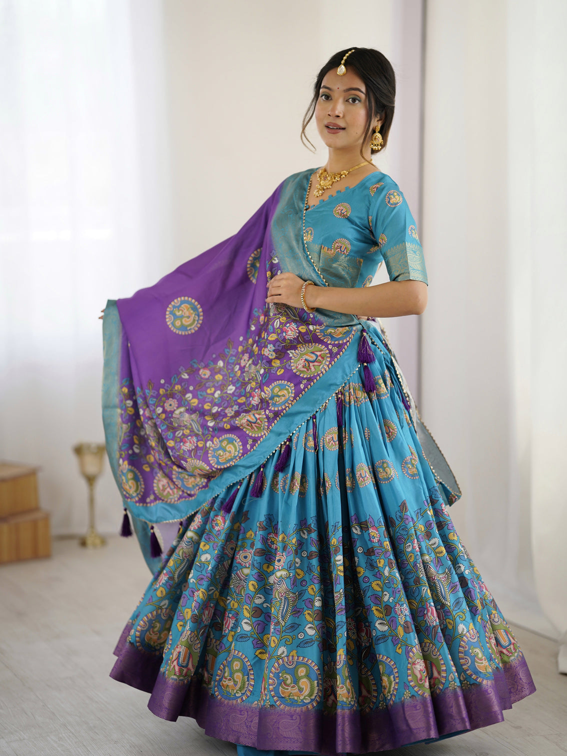 Turquoise blue purple kalamkari tussar silk lehenga with zari border tassel dupatta wedding festive wear