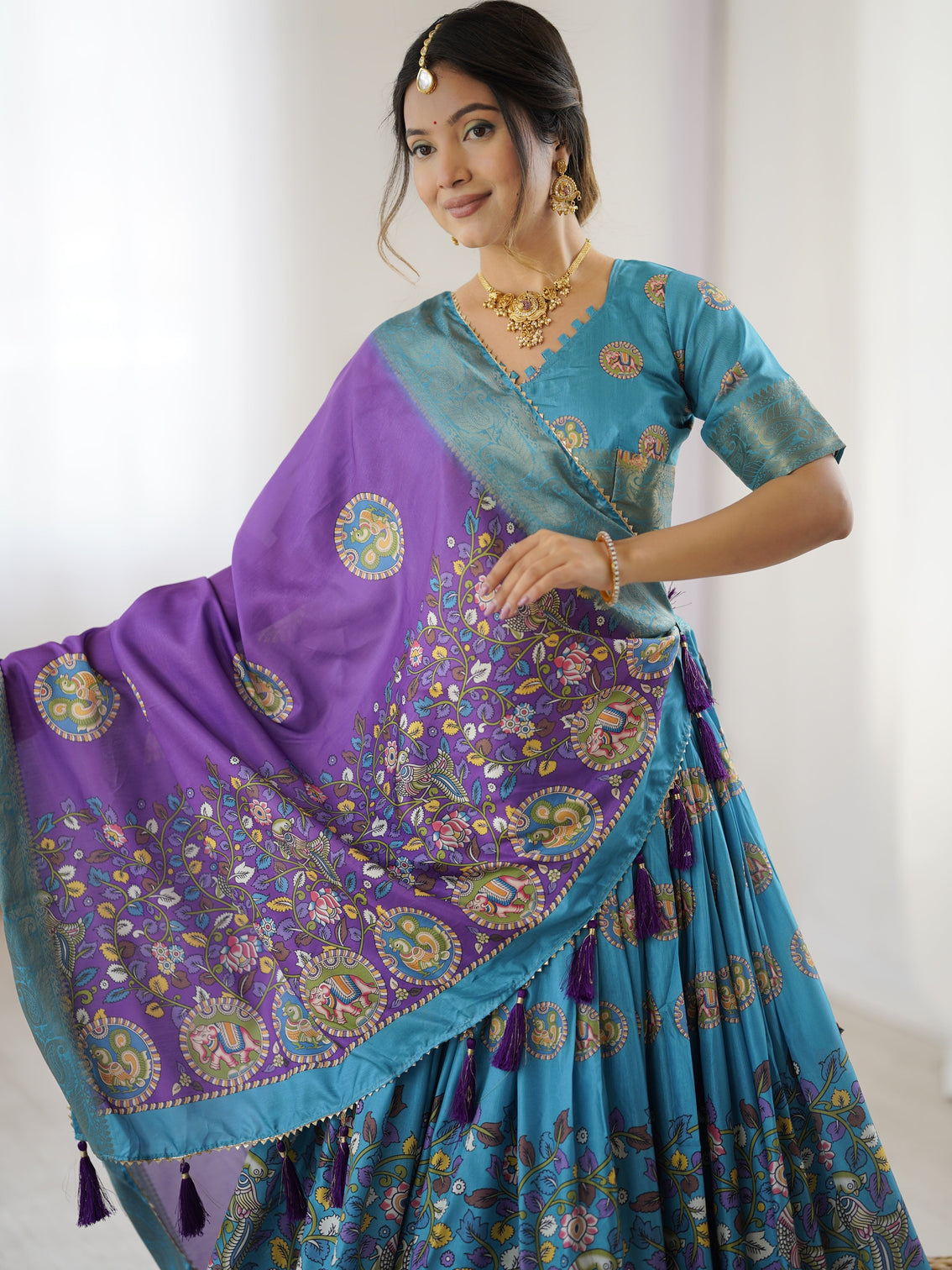 Turquoise blue purple kalamkari tussar silk lehenga with zari border tassel dupatta wedding festive wear