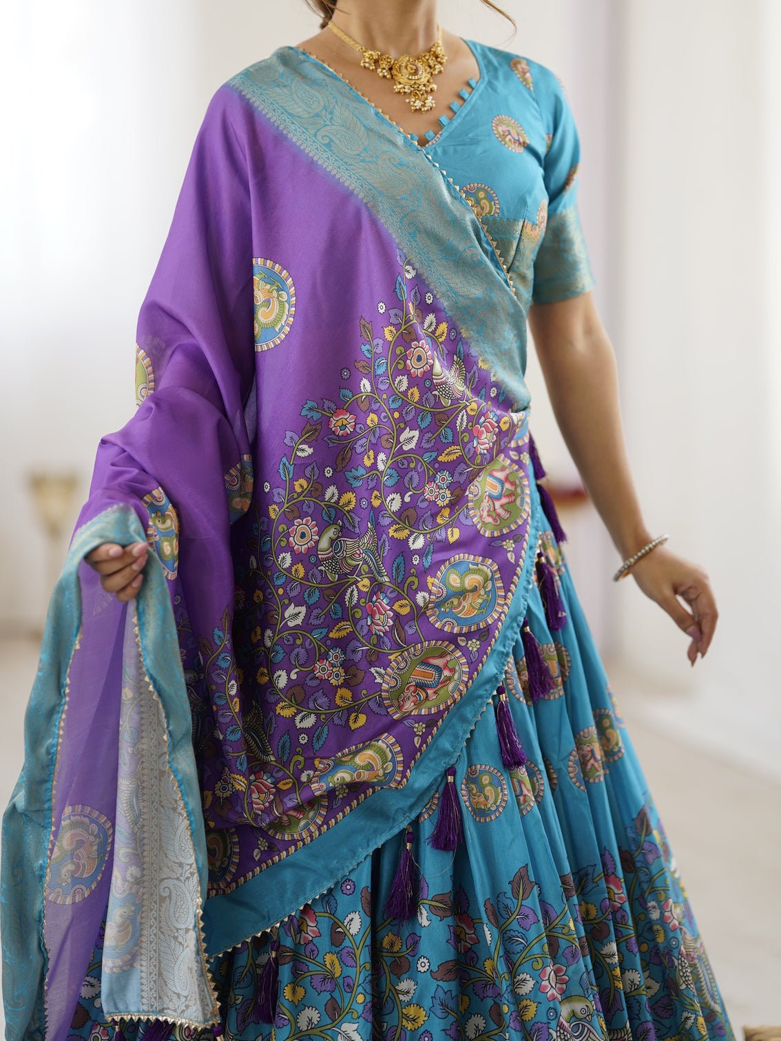Turquoise blue purple kalamkari tussar silk lehenga with zari border tassel dupatta wedding festive wear