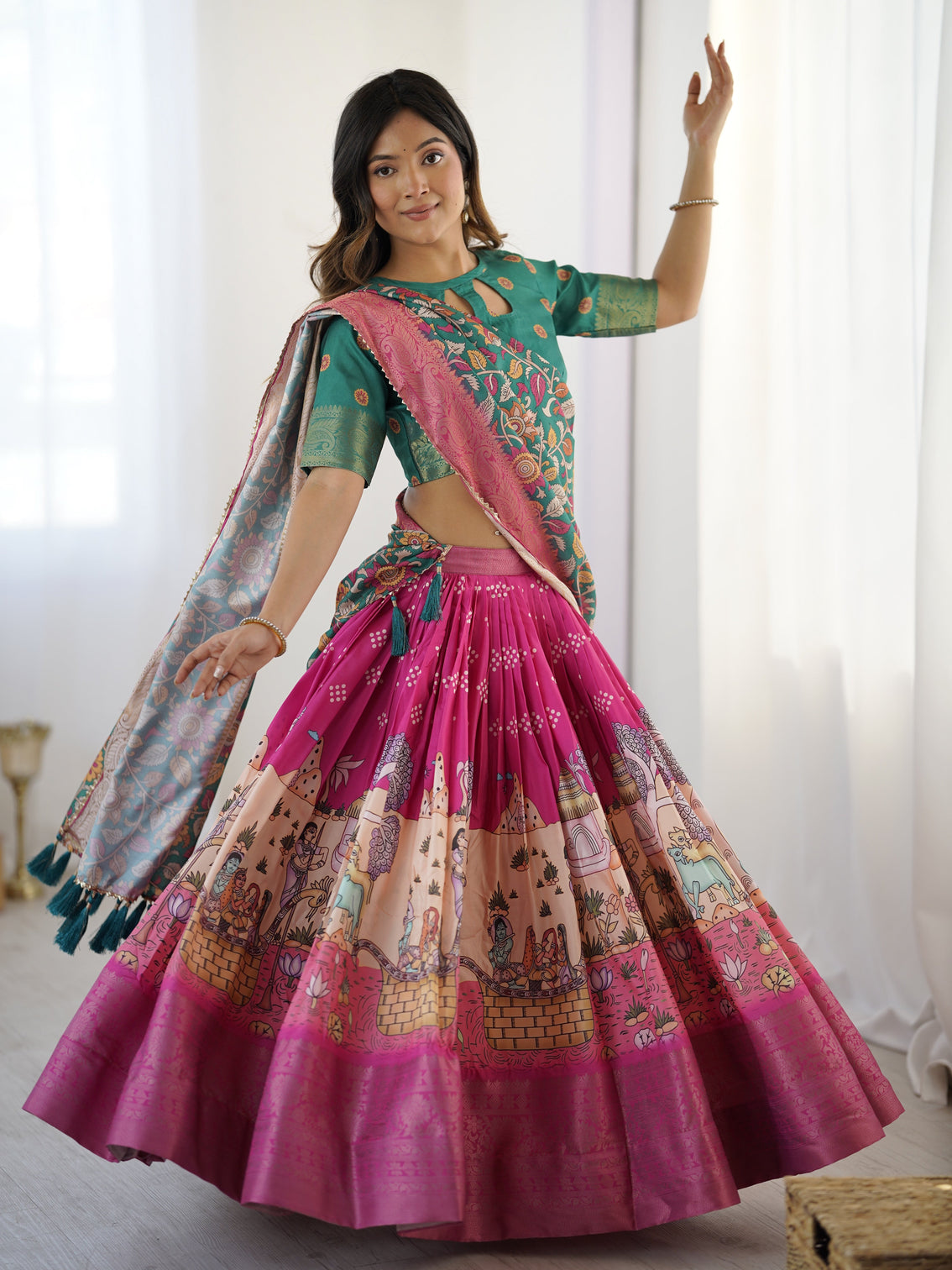 Elegant kalamkari lehenga in fuchsia pink and green with floral dupatta and story print skirt