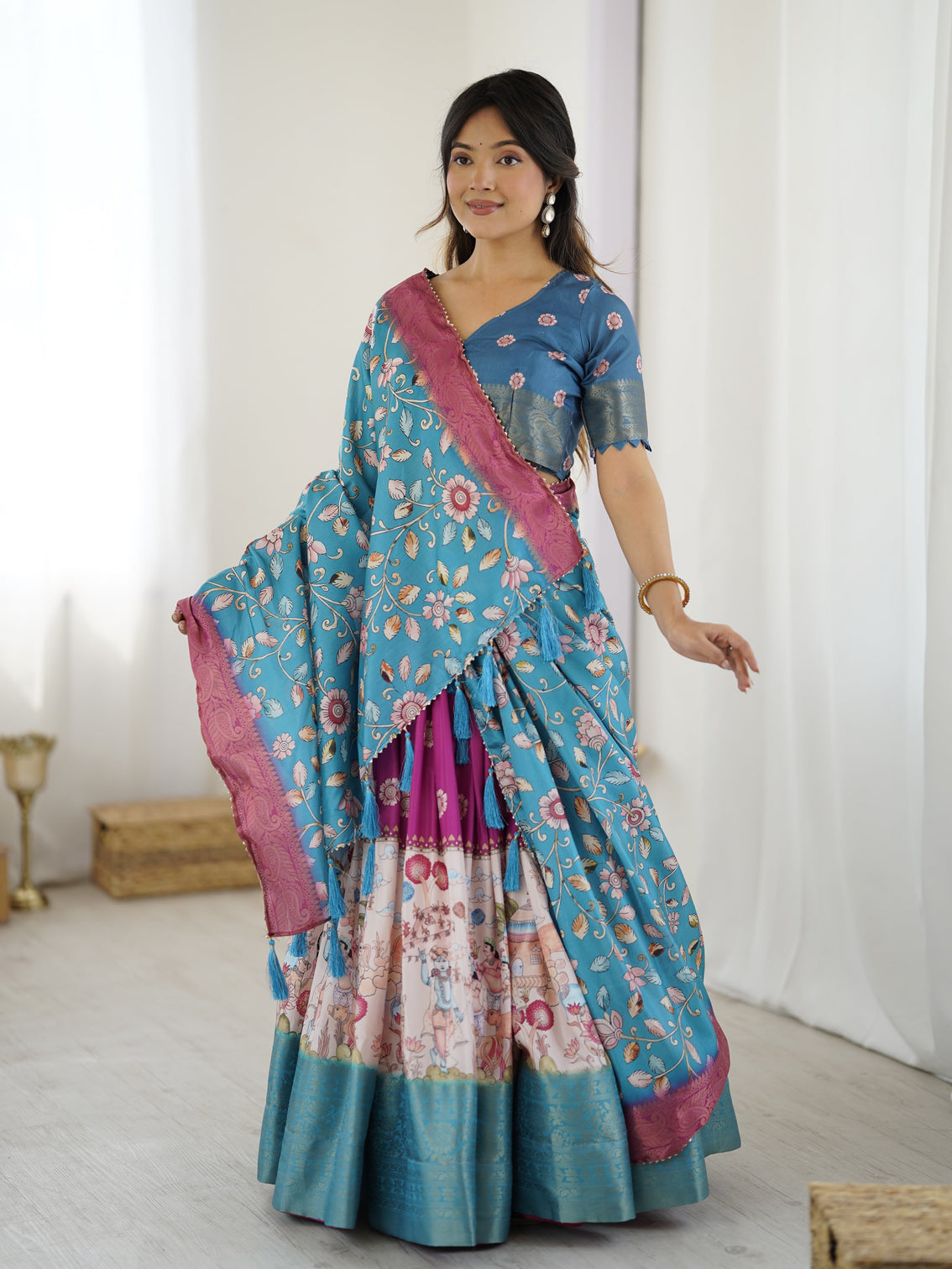 Peacock blue kalamkari lehenga with divine print and floral embroidered dupatta mameraa