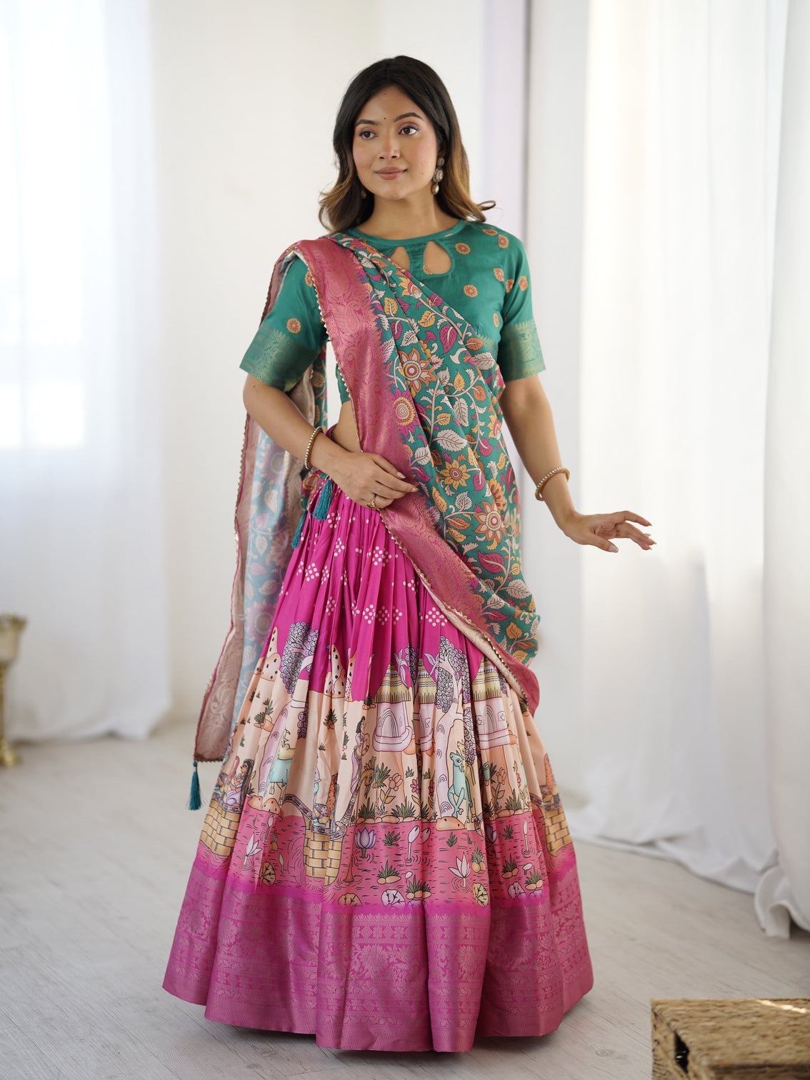 Elegant kalamkari lehenga in fuchsia pink and green with floral dupatta and story print skirt mameraa