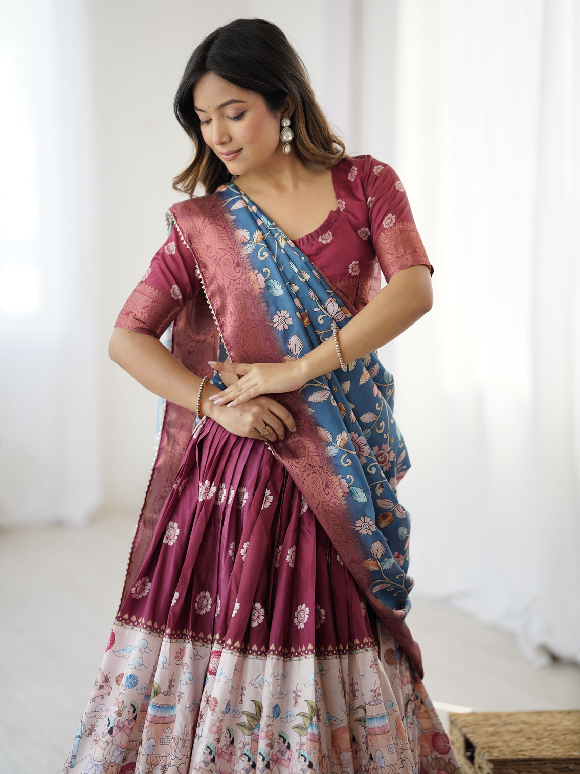 Wine maroon kalamkari lehenga with blue floral dupatta