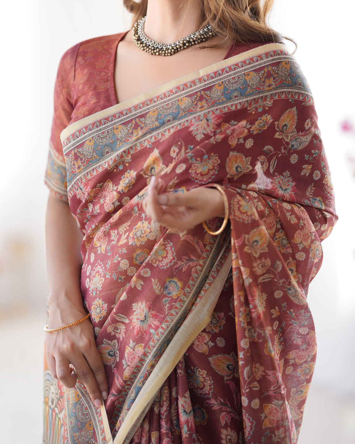 Rust maroon handloom cotton saree with floral jaal multicolor mandala pallu art