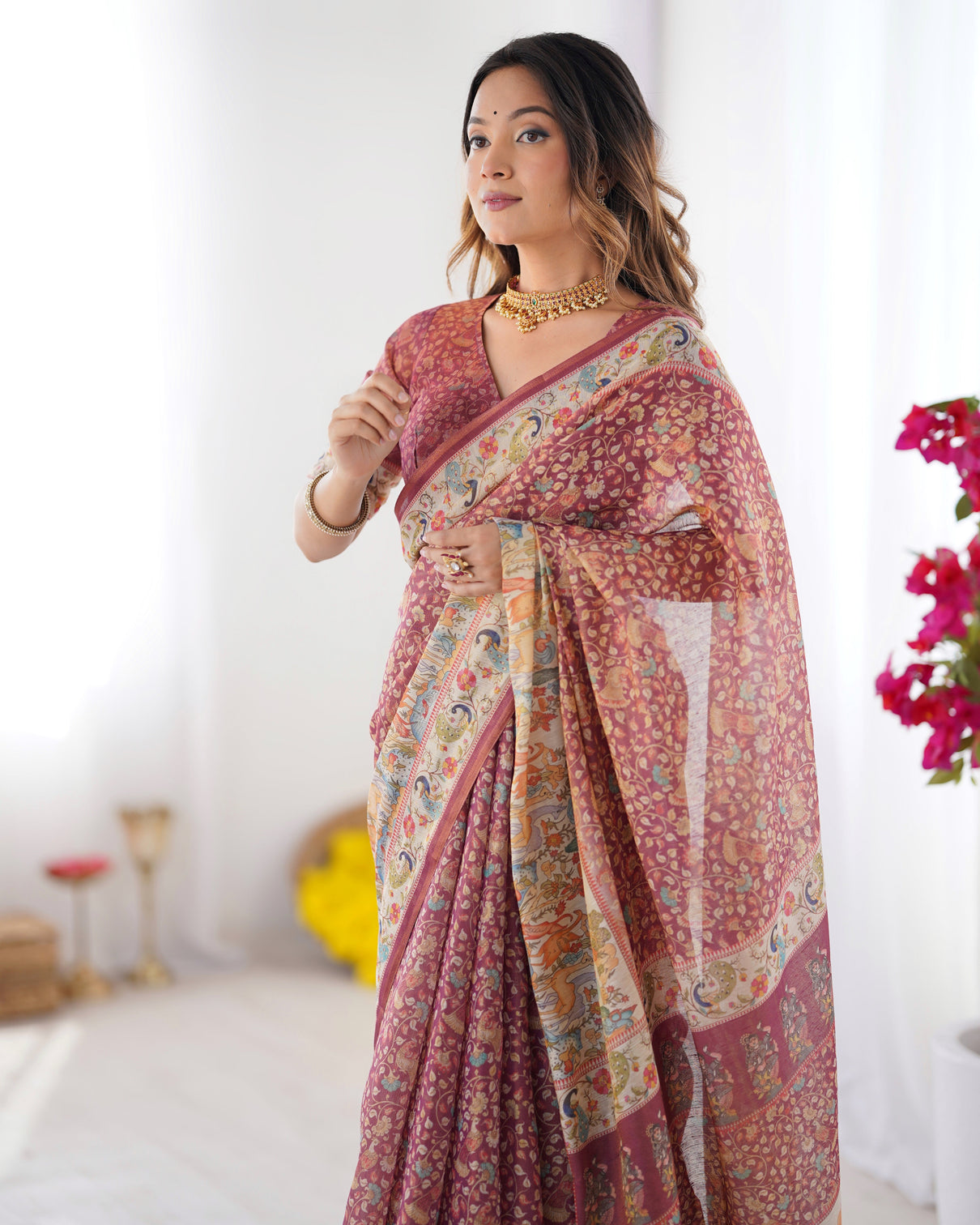 Maroon handloom cotton saree with all over floral print multicolor royal procession pallu