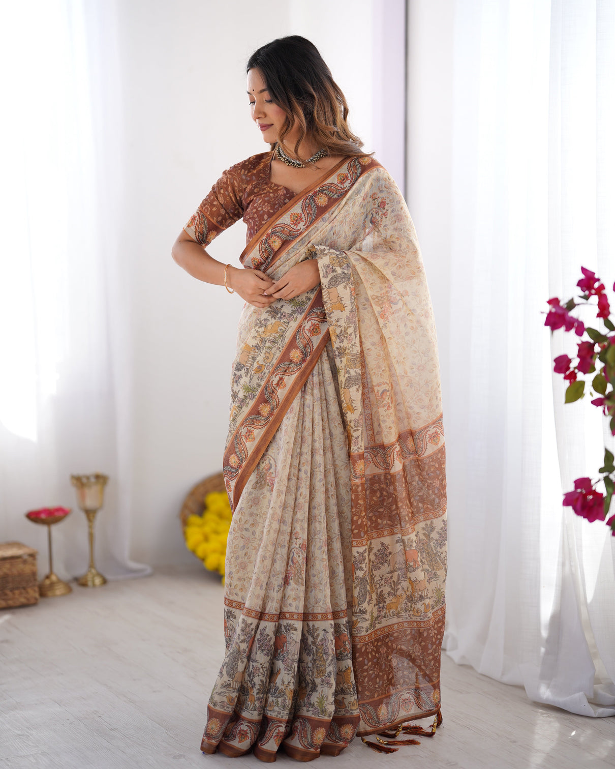 Elegant beige brown pure linen cotton handloom saree with animal motifs and floral prints