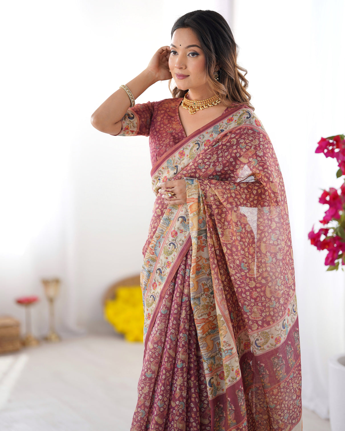Maroon handloom cotton saree with all over floral print multicolor royal procession pallu