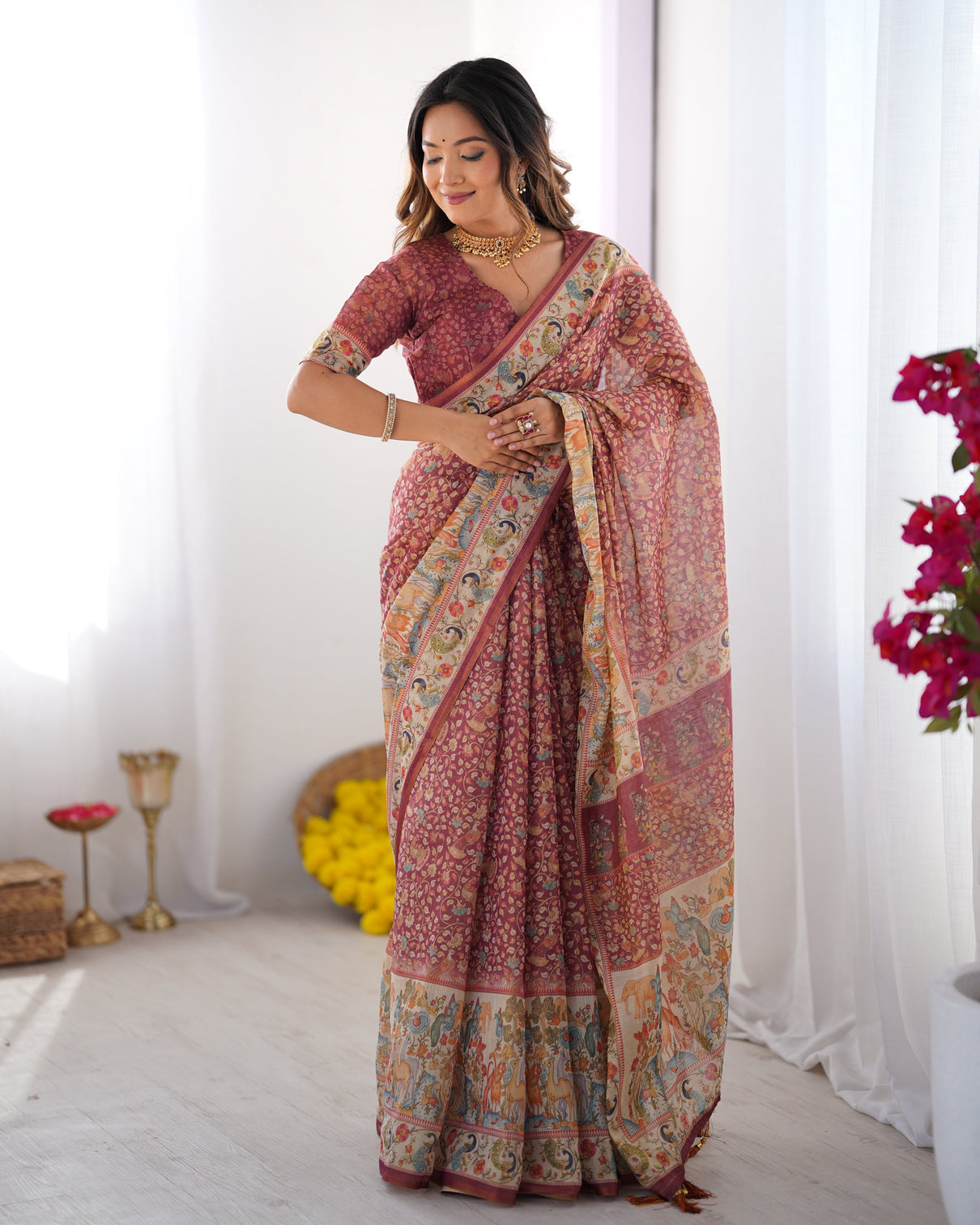 Maroon handloom cotton saree with all over floral print multicolor royal procession pallu