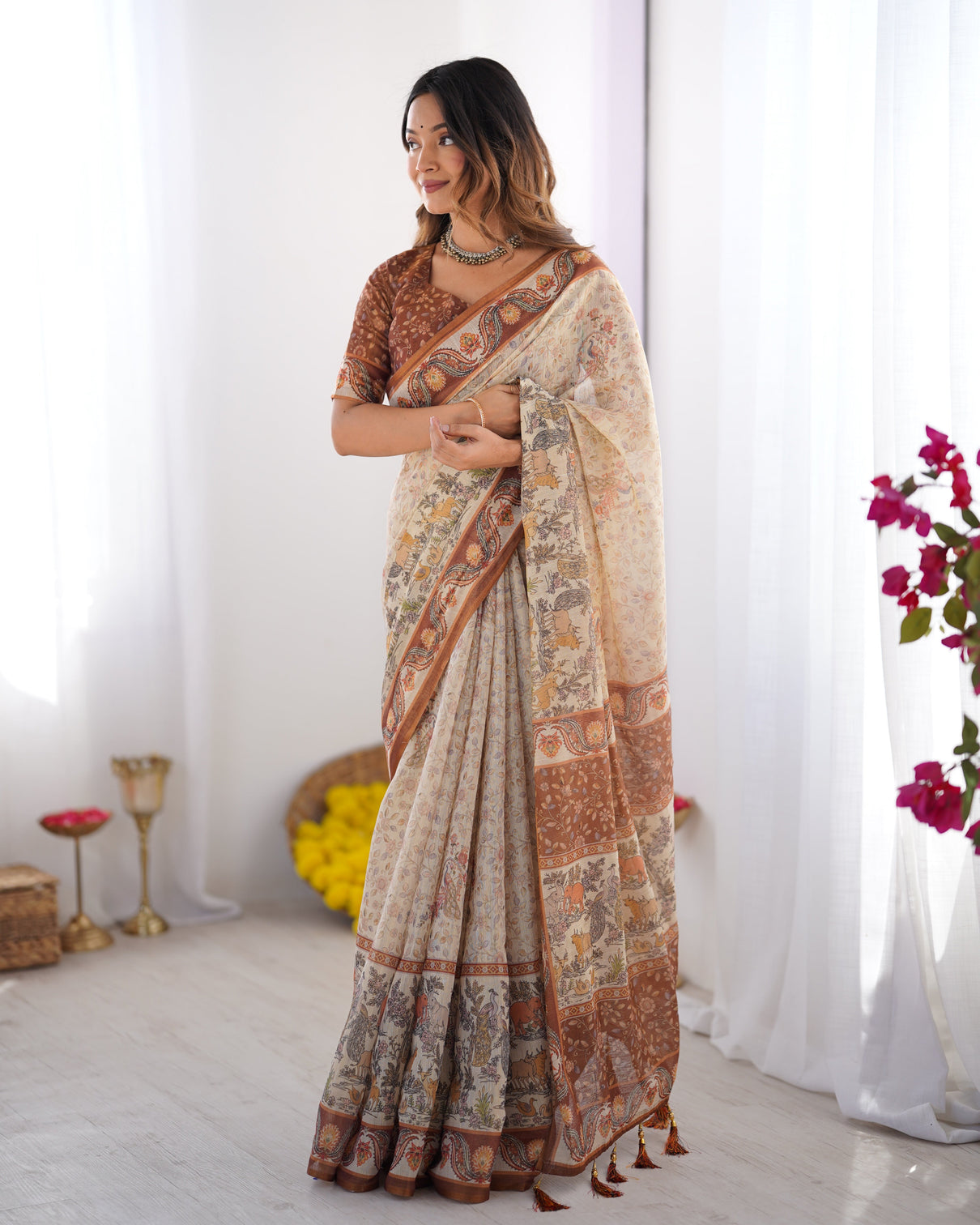 Elegant beige brown pure linen cotton handloom saree with animal motifs and floral prints