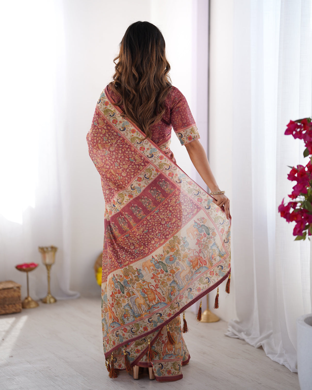 Maroon handloom cotton saree with all over floral print multicolor royal procession pallu