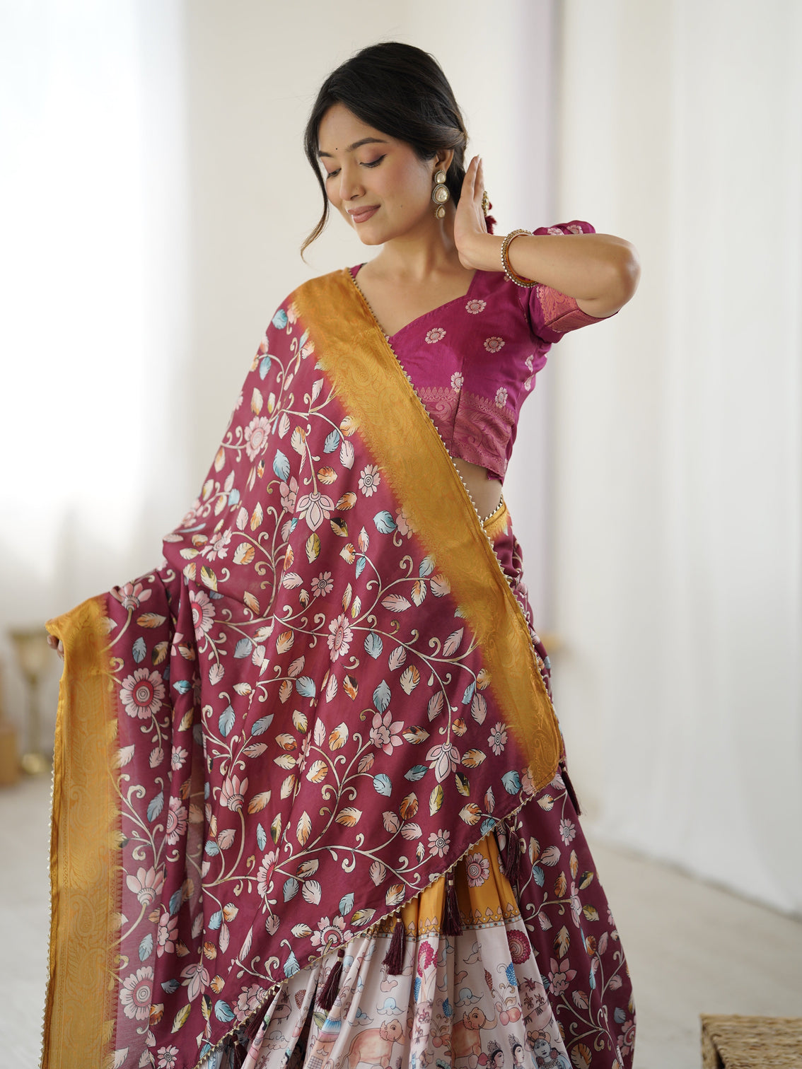 Maroon kalamkari lehenga with mustard zari embroidered dupatta