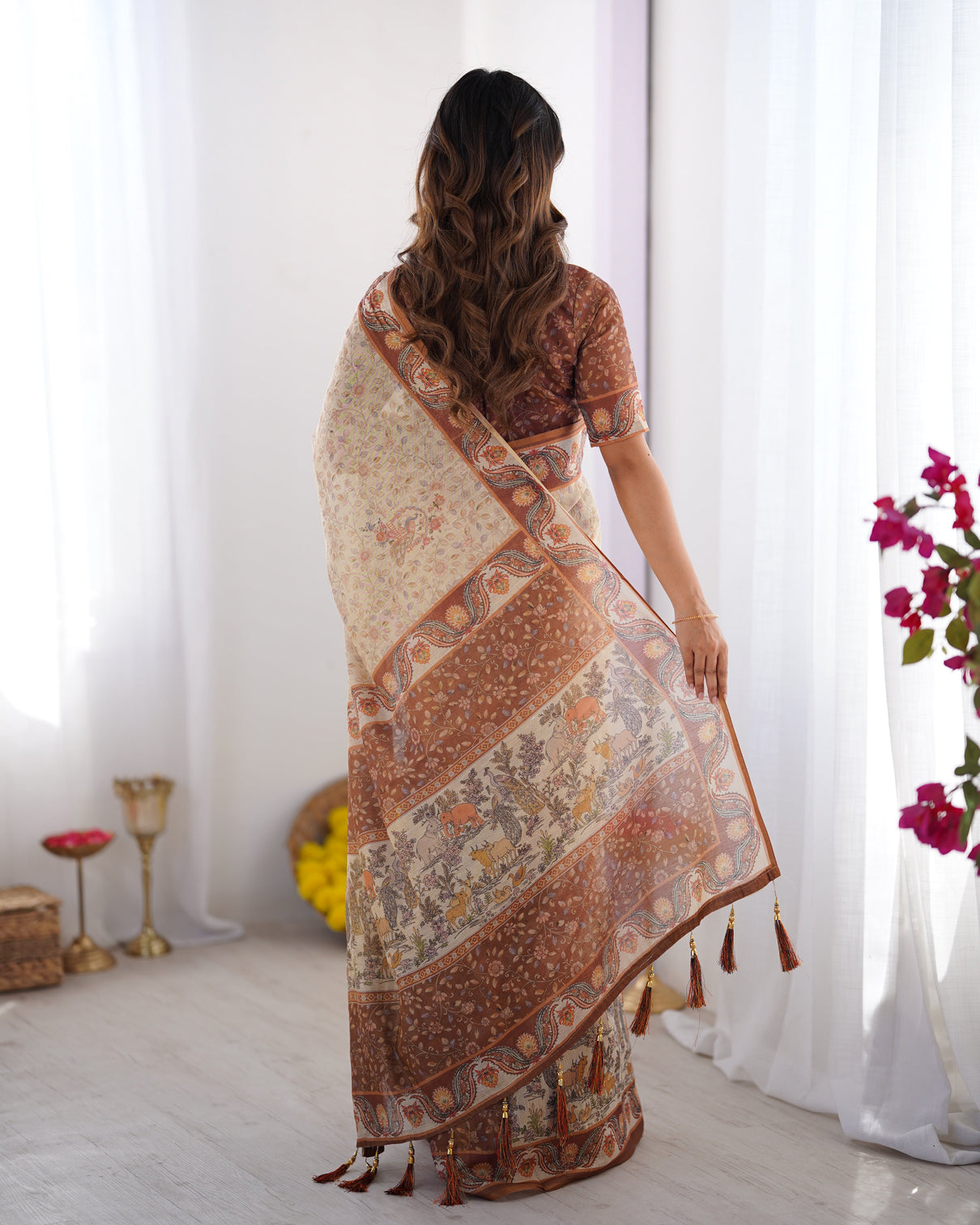 Elegant beige brown pure linen cotton handloom saree with animal motifs and floral prints
