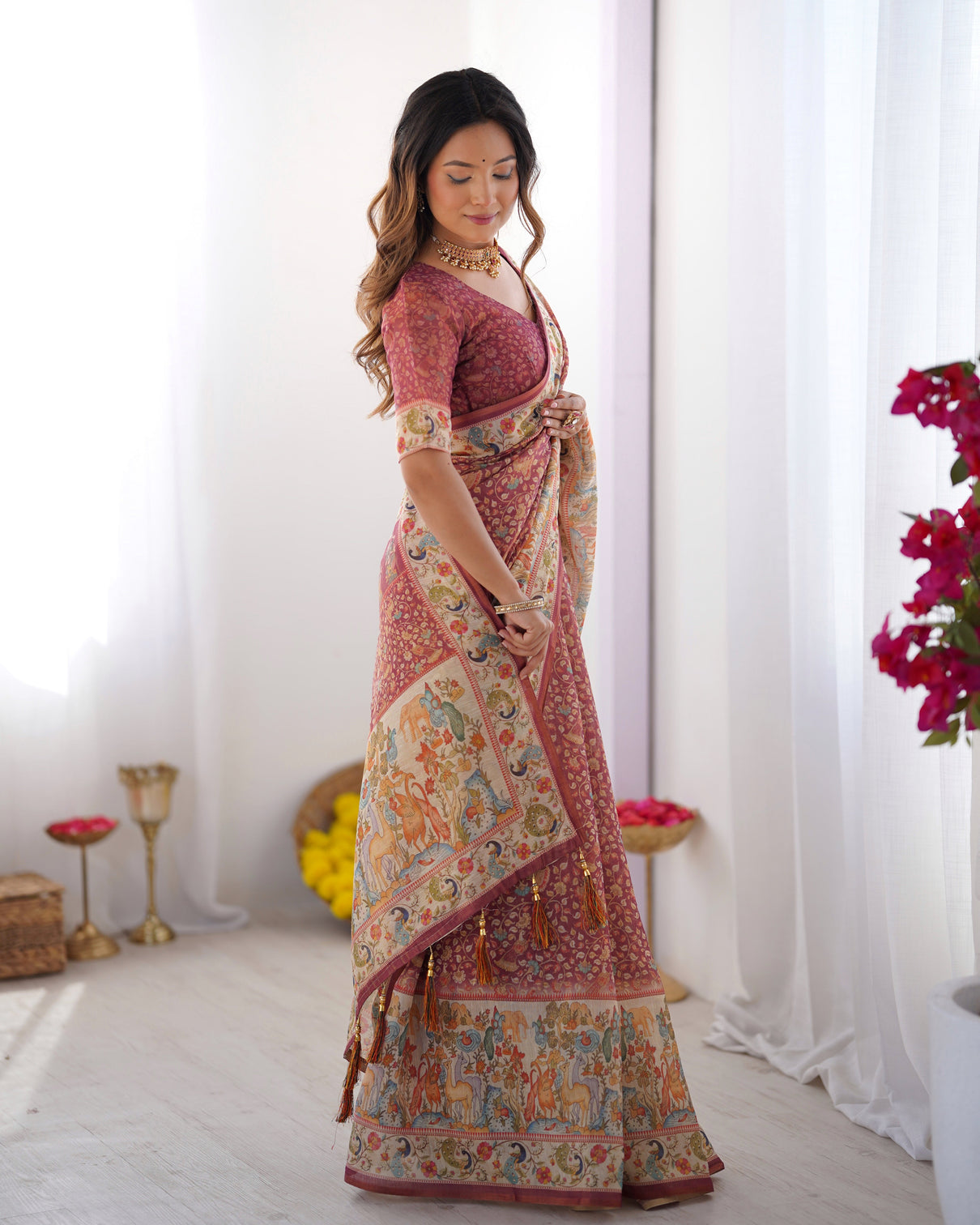 Maroon handloom cotton saree with all over floral print multicolor royal procession pallu