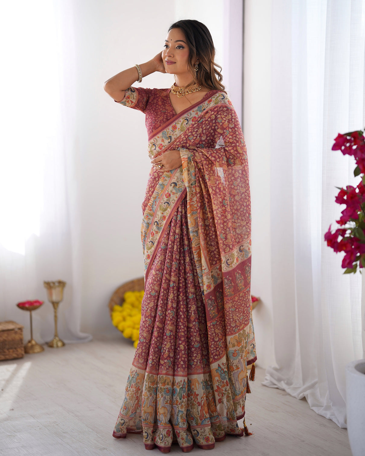 Maroon handloom cotton saree with all over floral print multicolor royal procession pallu