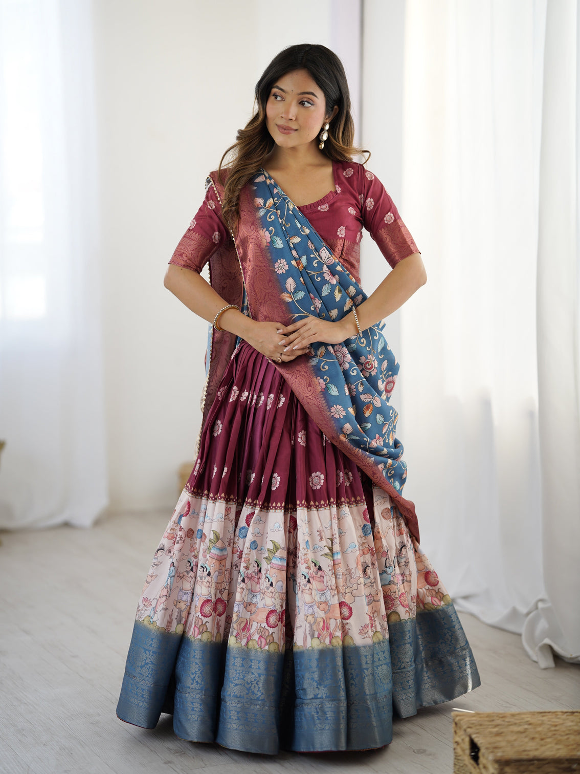 Wine maroon kalamkari lehenga with blue floral dupatta mameraa