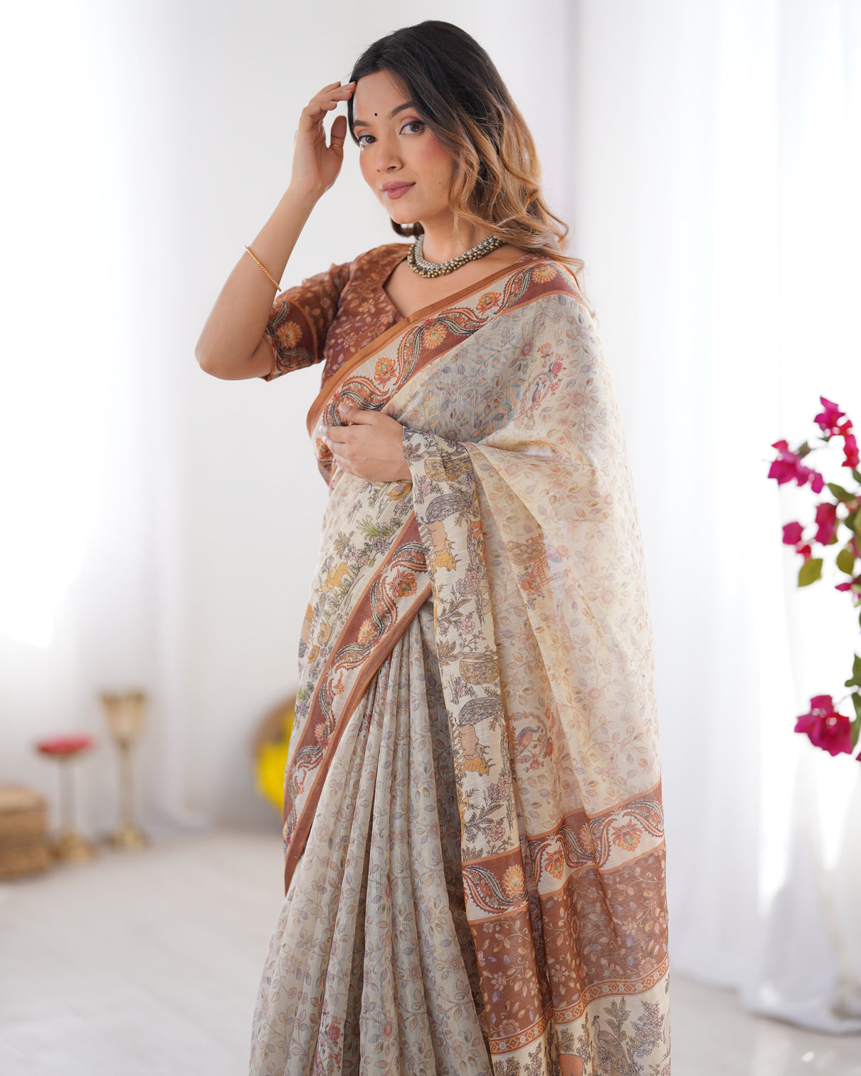 Elegant beige brown pure linen cotton handloom saree with animal motifs and floral prints