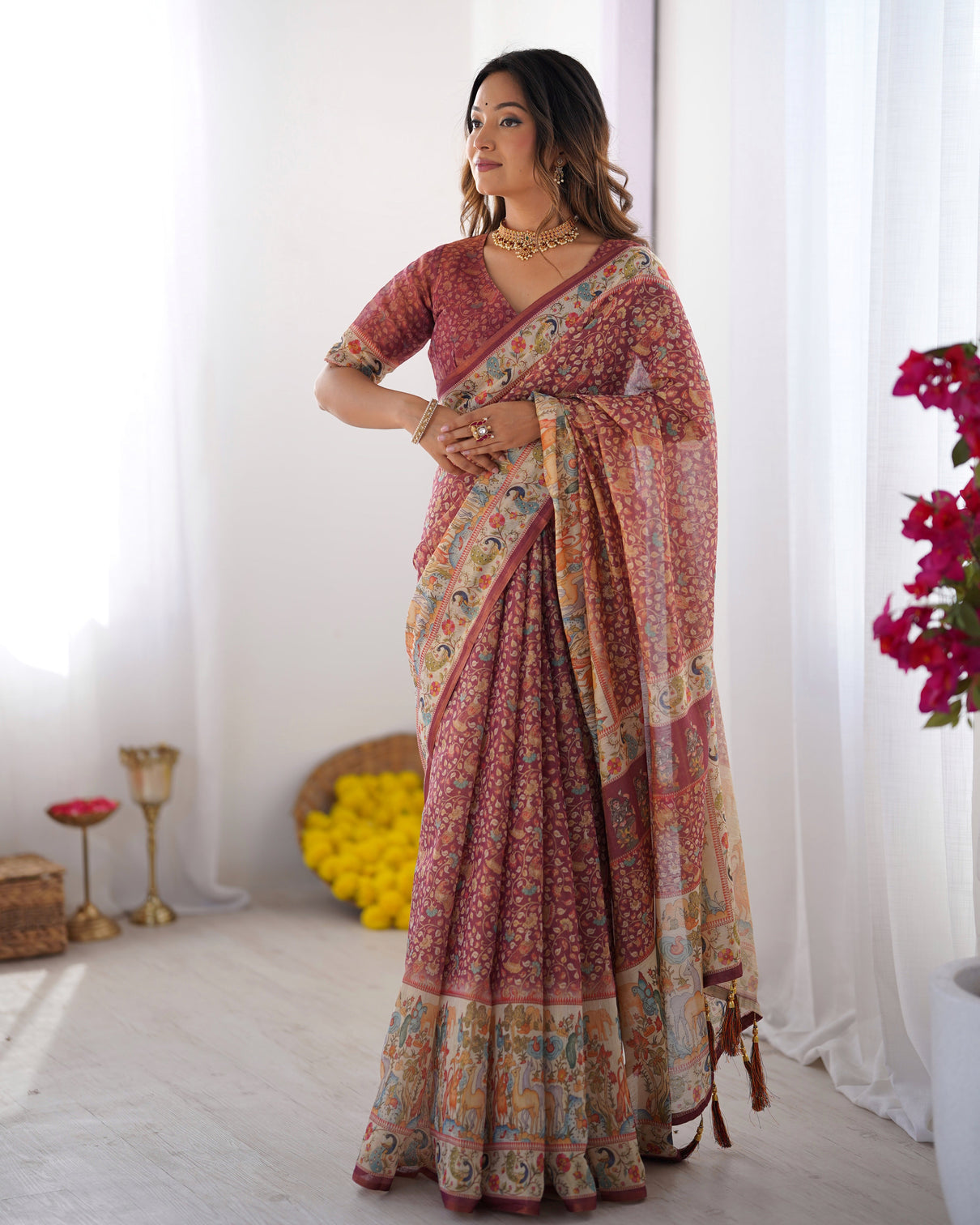 Maroon handloom cotton saree with all over floral print multicolor royal procession pallu