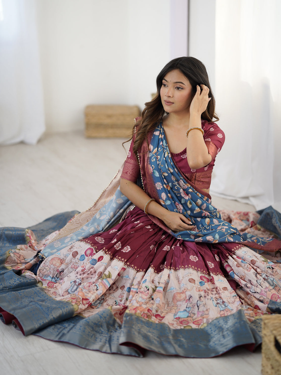 Wine maroon kalamkari lehenga with blue floral dupatta
