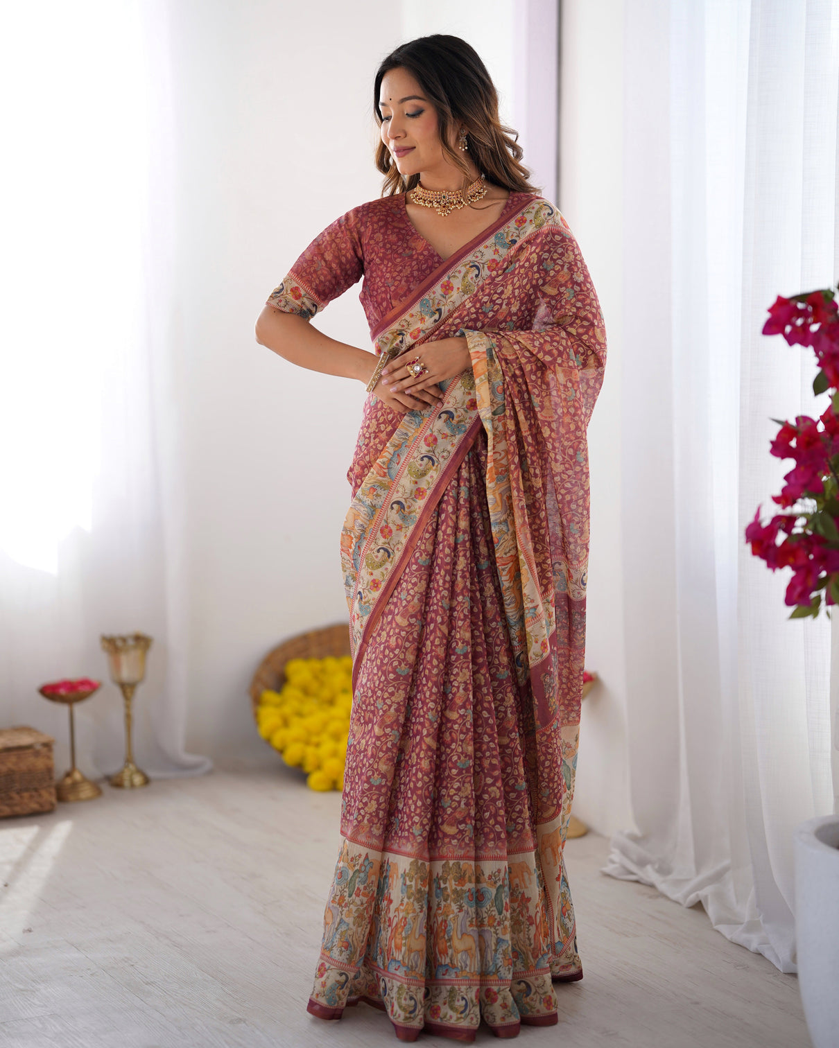 Maroon handloom cotton saree with all over floral print multicolor royal procession pallu