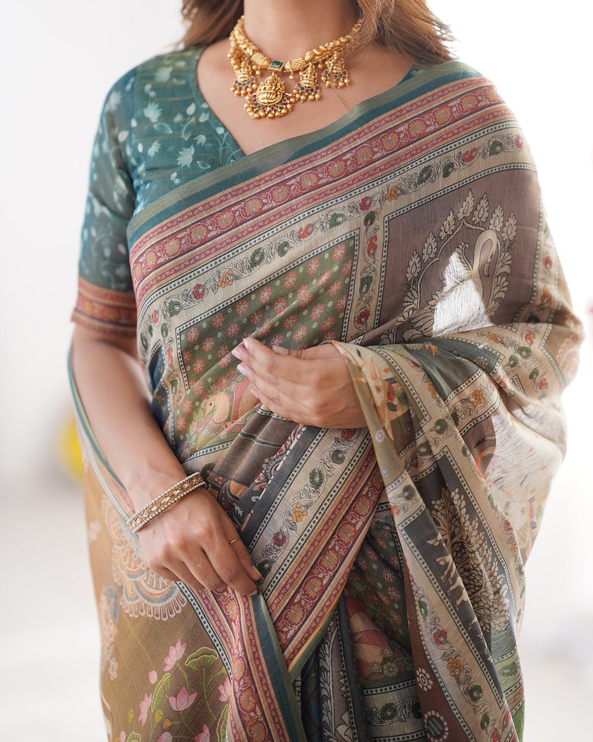 Teal green brown pure linen cotton handloom saree with royal cow tree motif pallu