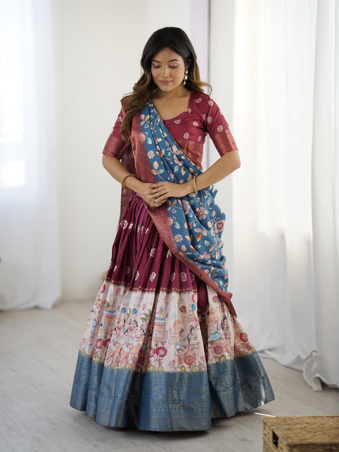 Wine maroon kalamkari lehenga with blue floral dupatta