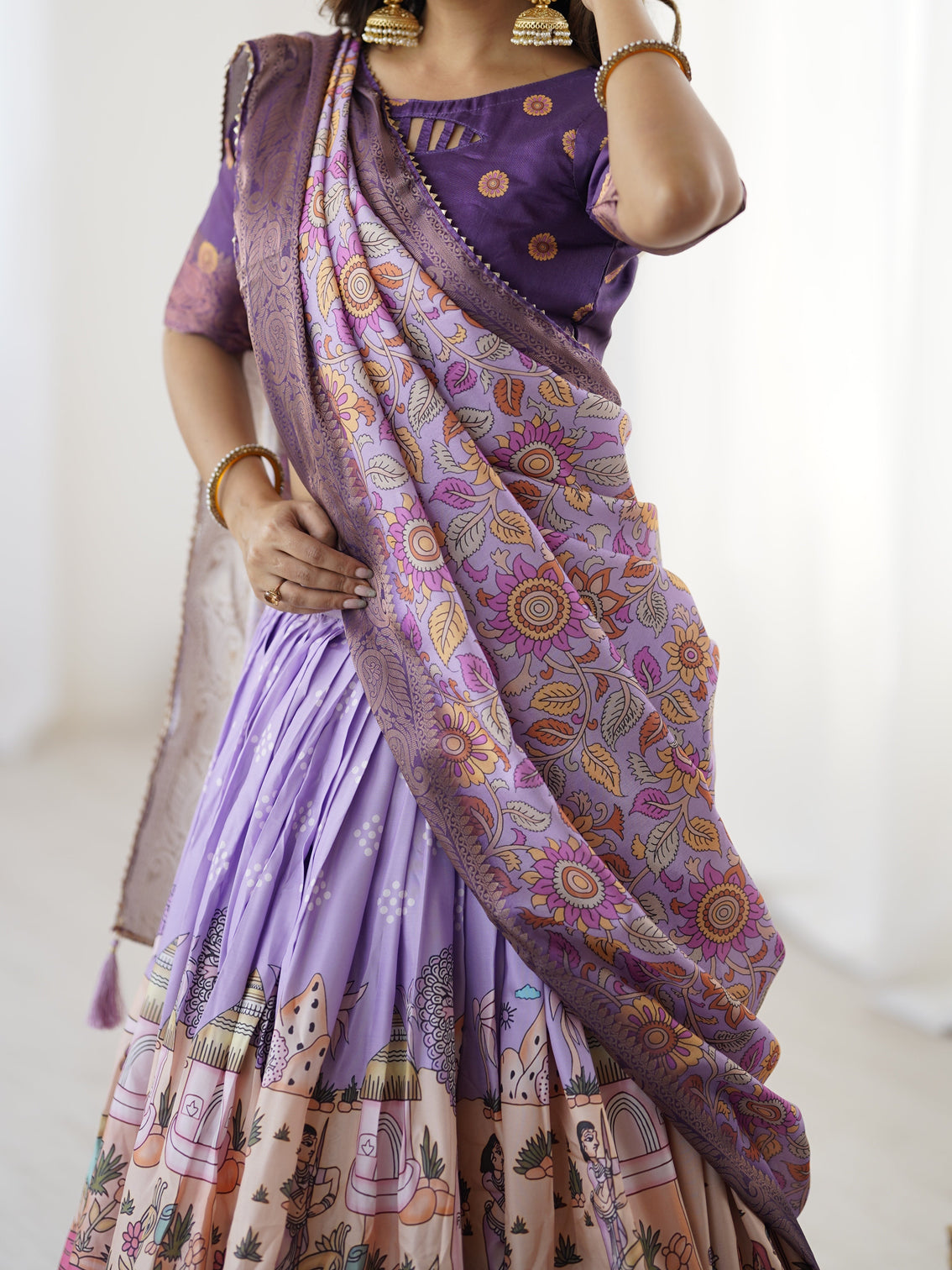 Elegant kalamkari lehenga in lavender and purple with mythical print and floral dupatta