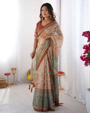 Beige green handloom cotton saree with village life print and majestic peacock pallu mameraa
