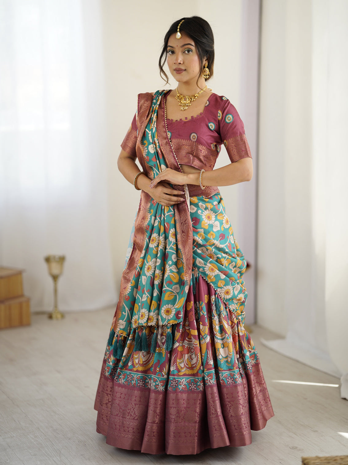 Wine turquoise kalamkari tussar silk lehenga with floral motifs zari border tassel dupatta wedding festive wear mameraa