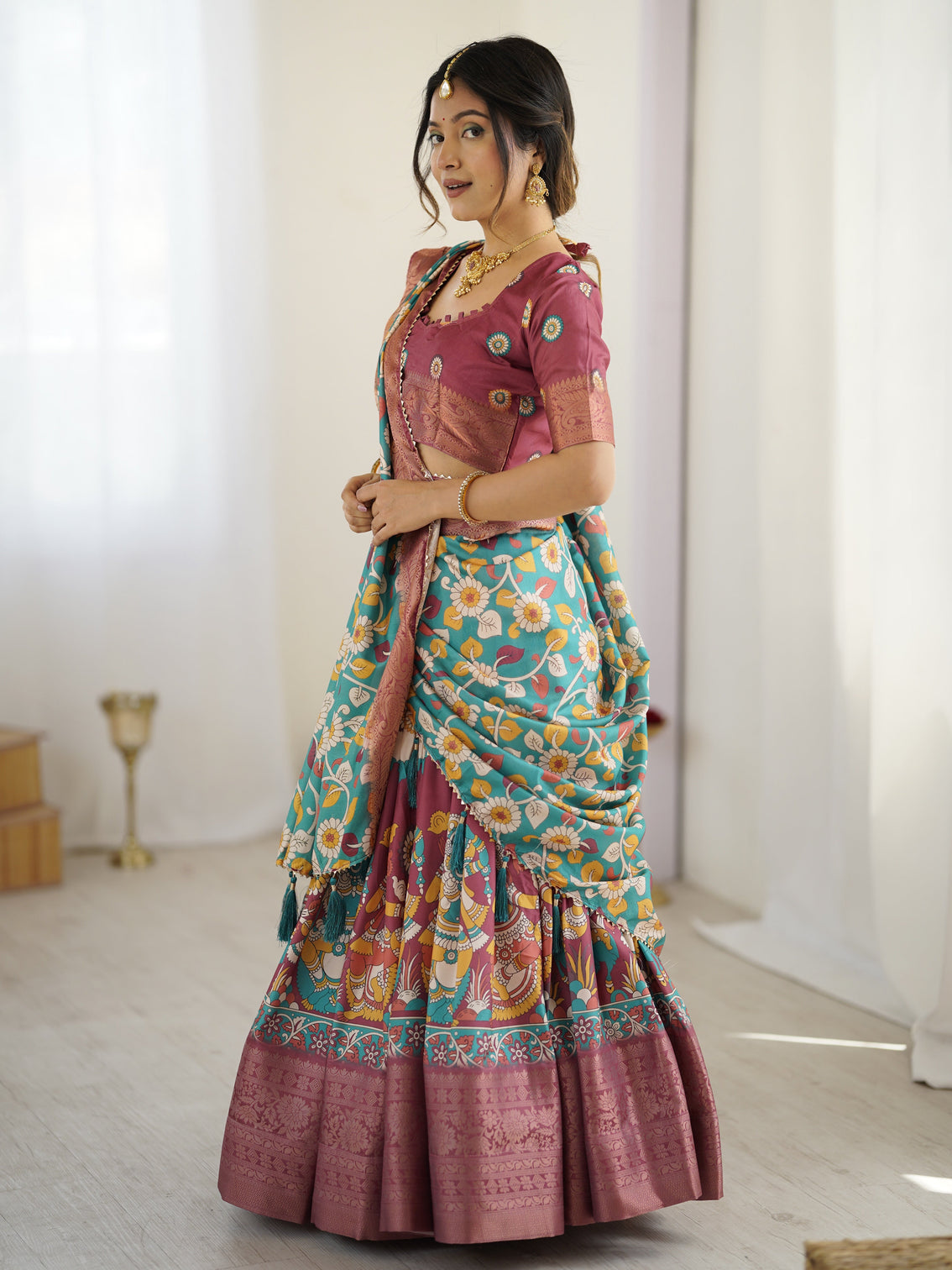 Wine turquoise kalamkari tussar silk lehenga with floral motifs zari border tassel dupatta wedding festive wear