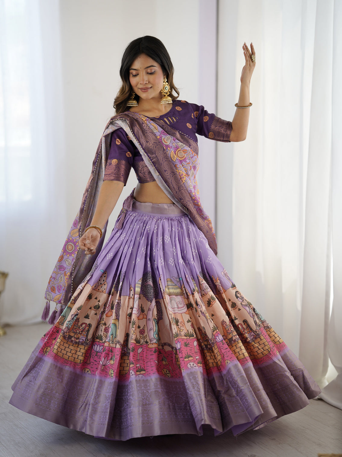 Elegant kalamkari lehenga in lavender and purple with mythical print and floral dupatta