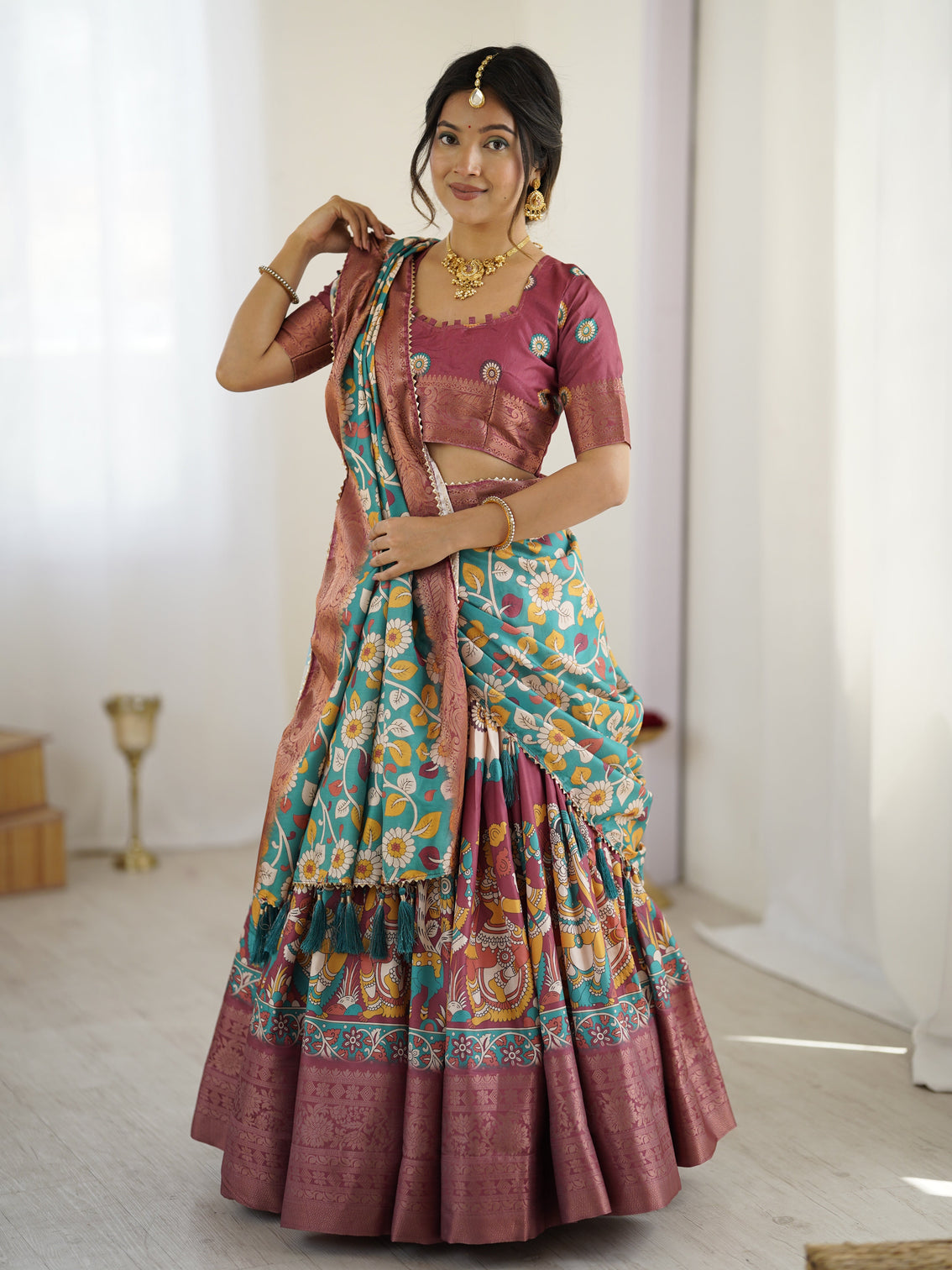 Wine turquoise kalamkari tussar silk lehenga with floral motifs zari border tassel dupatta wedding festive wear