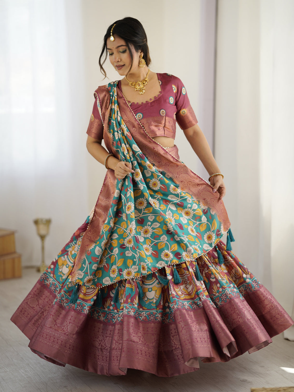 Wine turquoise kalamkari tussar silk lehenga with floral motifs zari border tassel dupatta wedding festive wear