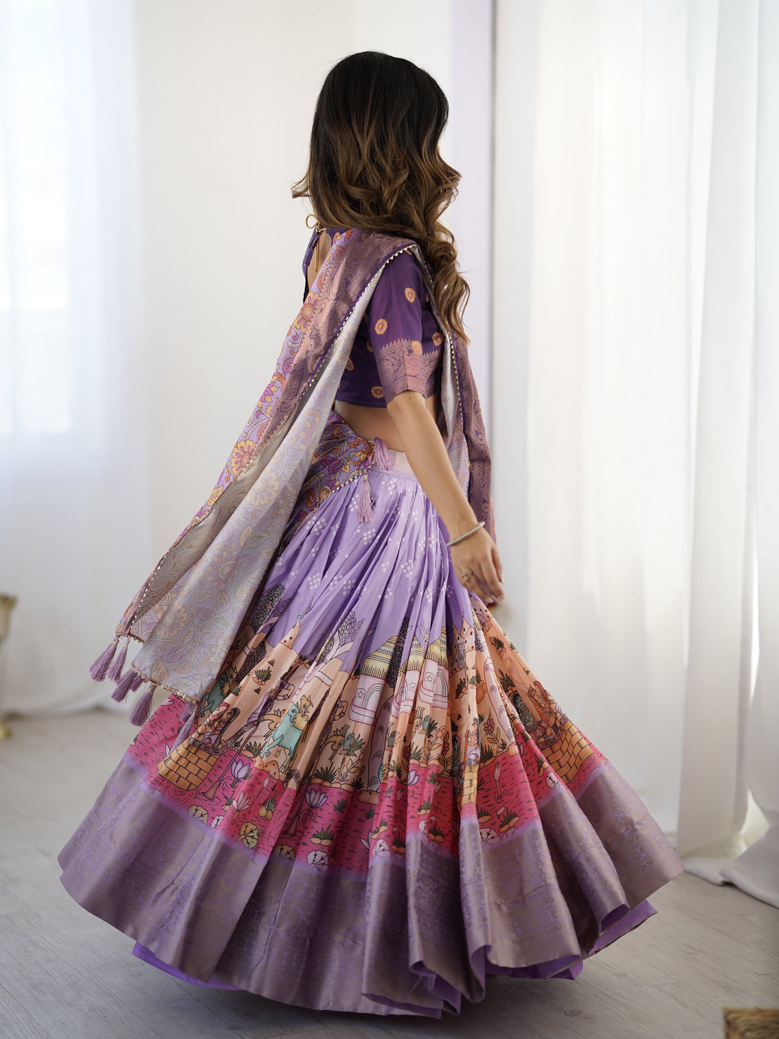 Elegant kalamkari lehenga in lavender and purple with mythical print and floral dupatta