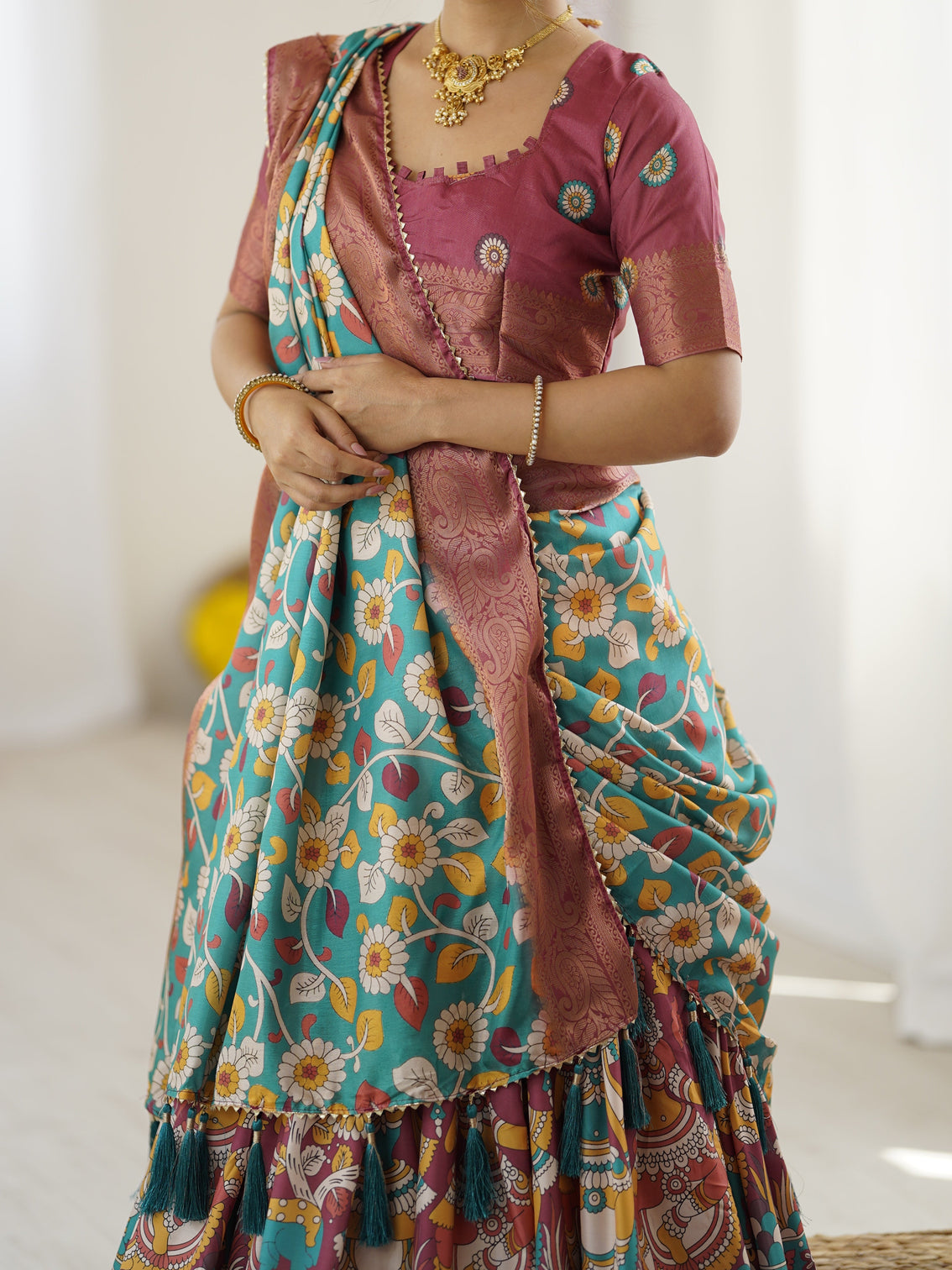Wine turquoise kalamkari tussar silk lehenga with floral motifs zari border tassel dupatta wedding festive wear