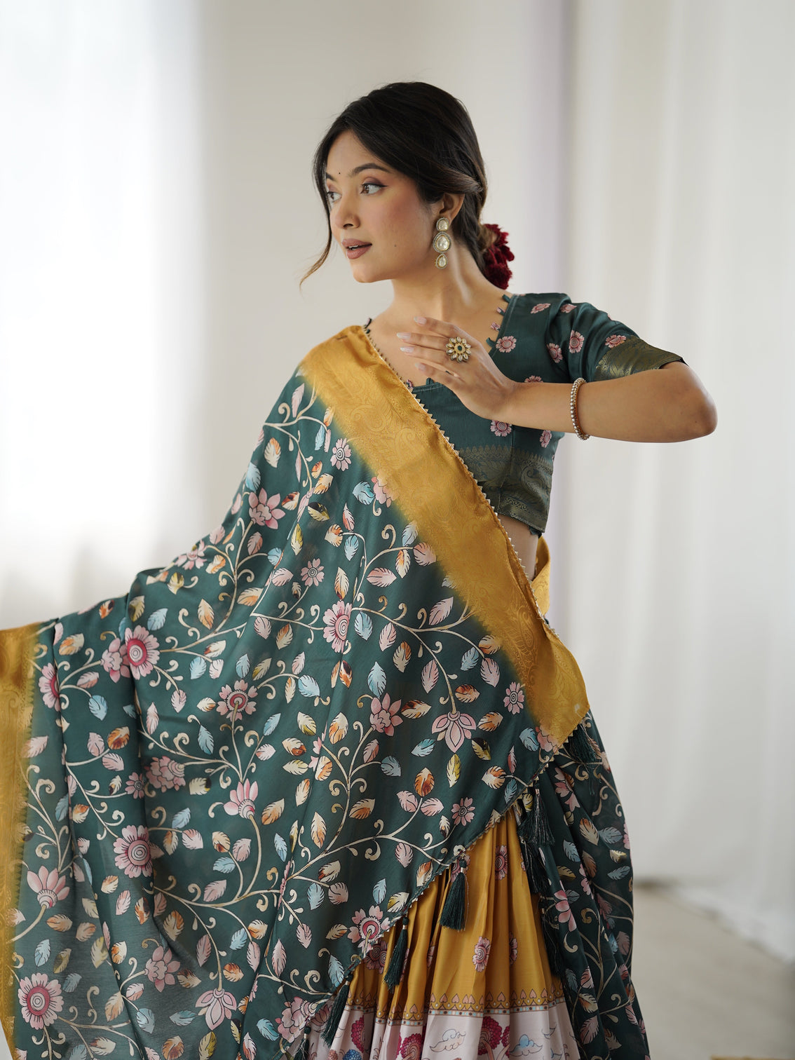 Bottle green kalamkari flared lehenga with mustard dupatta