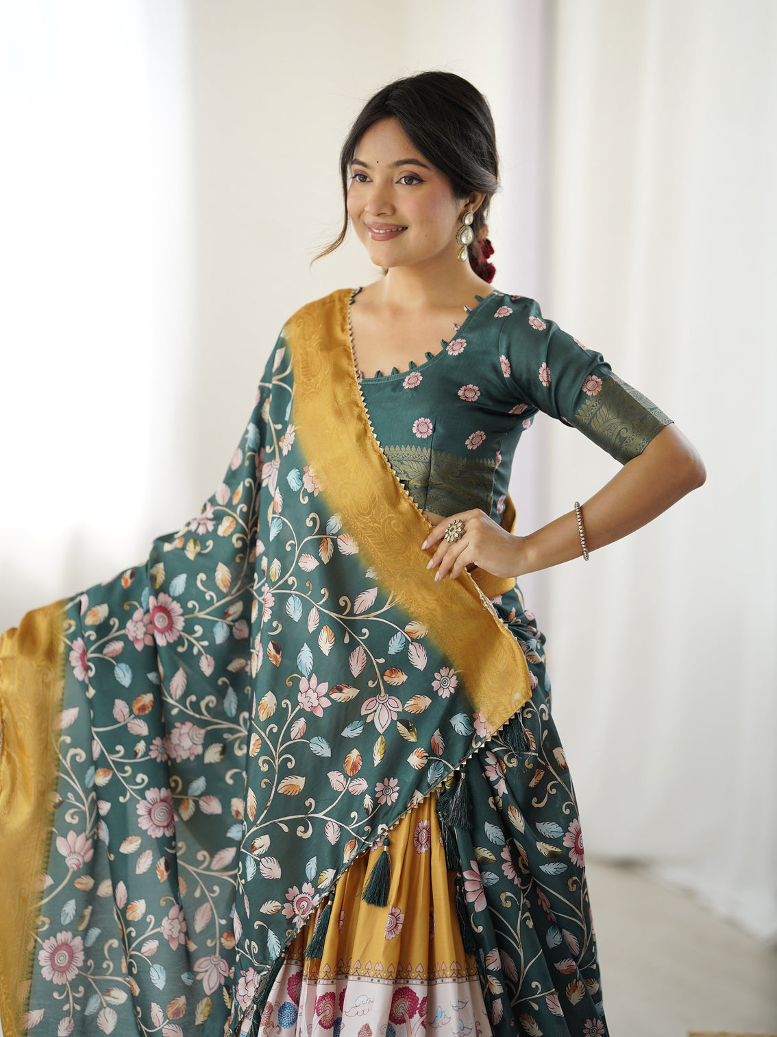 Bottle green kalamkari flared lehenga with mustard dupatta