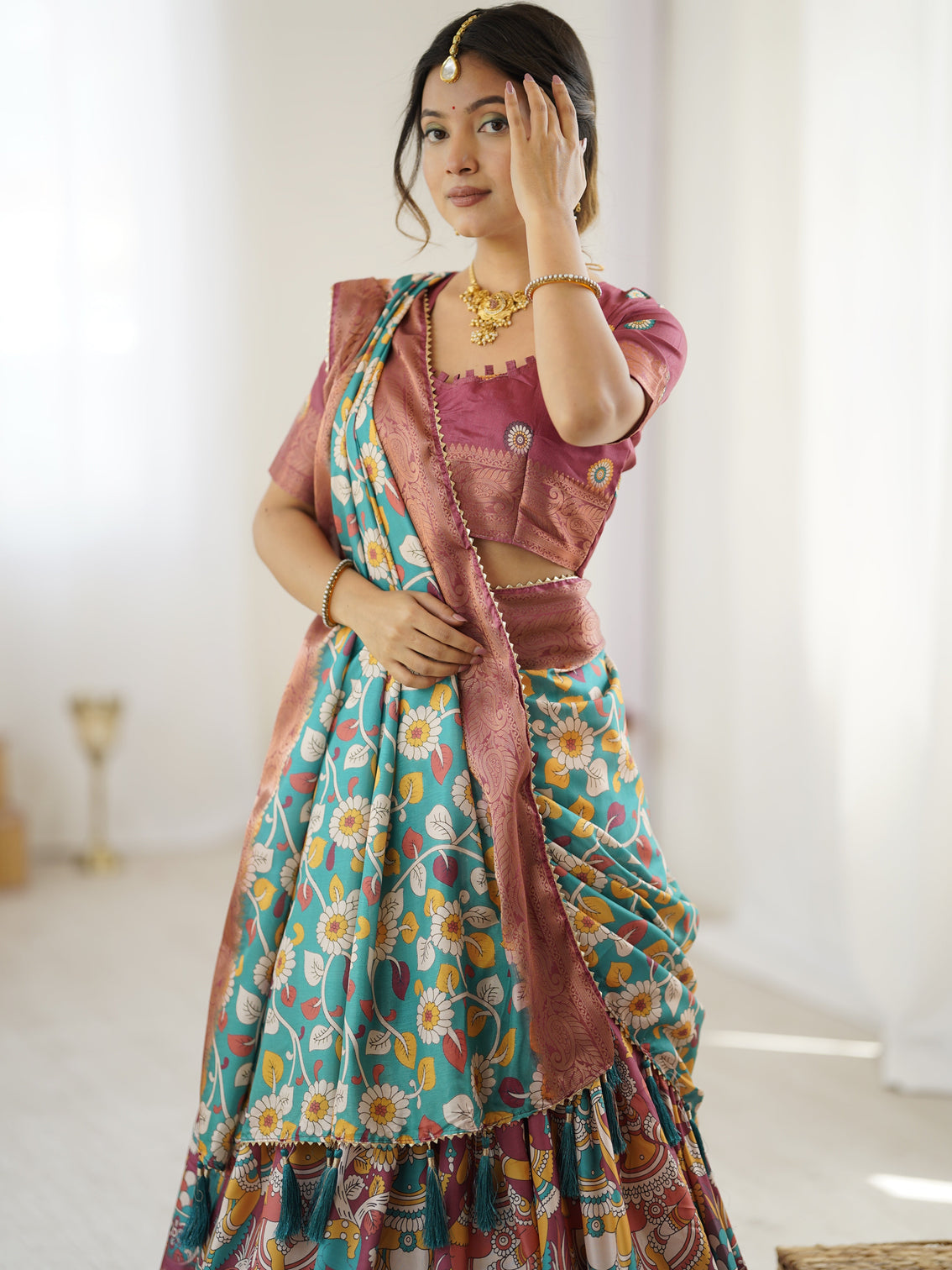 Wine turquoise kalamkari tussar silk lehenga with floral motifs zari border tassel dupatta wedding festive wear