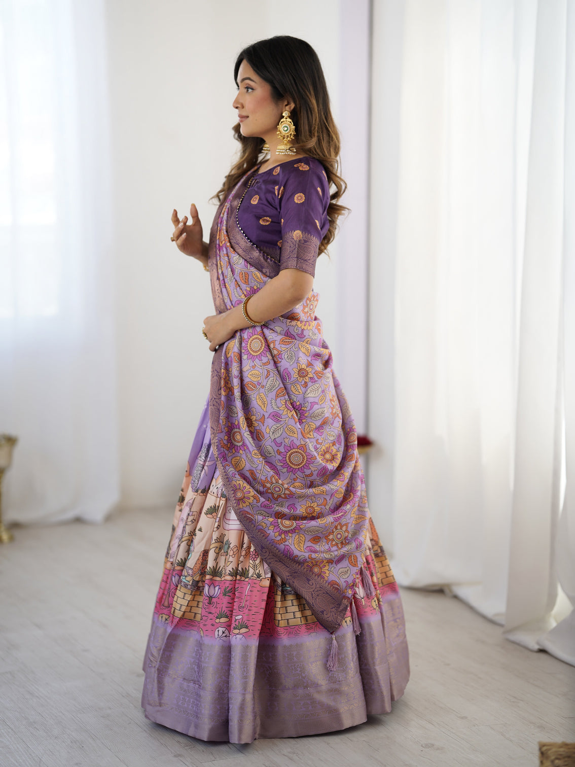 Elegant kalamkari lehenga in lavender and purple with mythical print and floral dupatta